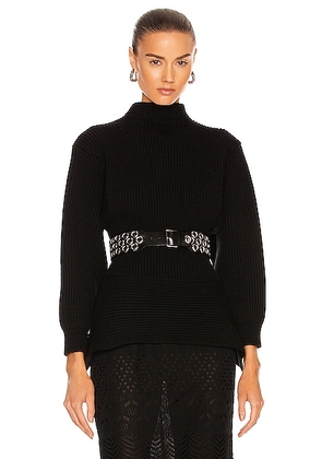ALAÏA Fitted Sculpted Long Sleeve Sweater in Noir - Black. Size 38 (also in ).