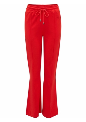 JW Anderson kick-flare track pants - Red
