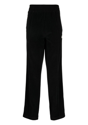 Moncler logo-appliqué straight-leg trousers - Black