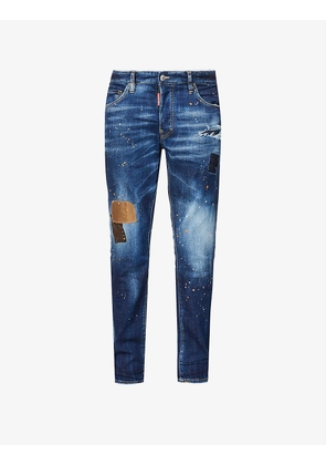 Skater paint-splattered tapered stretch-denim jeans