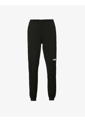 Tekware mid-rise tapered-leg stretch-woven trousers