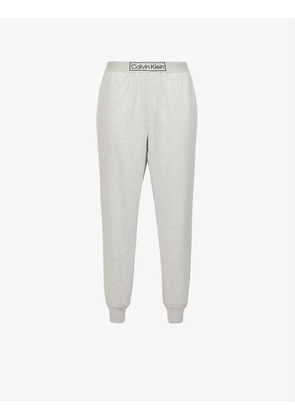 Reimagined logo-band relaxed-fit mid-rise cotton and recycled polyester blend jogging bottoms