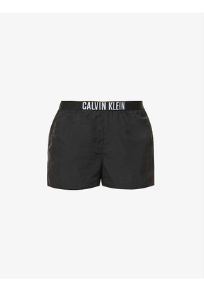Intense Power branded mid-rise shell shorts
