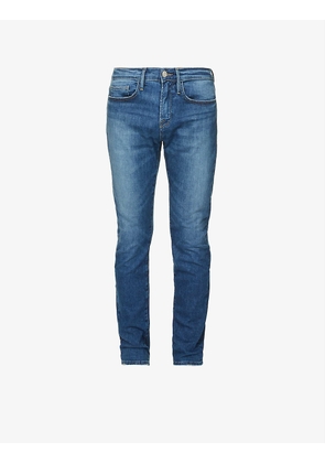 L'Homme mid-rise tapered-leg stretch organic denim jeans