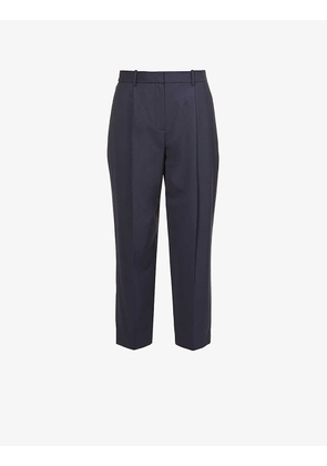 Carrot pressed-crease tapered relaxed-fit mid-rise stretch-wool trousers