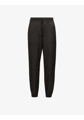 Anagram-pattern high-rise stretch-woven tracksuit bottoms