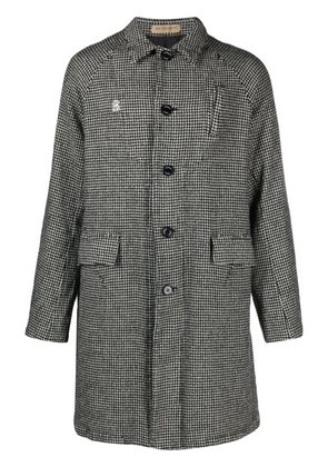 Undercover houndstooth logo-patch wool coat - Black