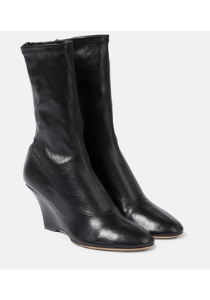 Khaite Apollo wedge leather ankle boots