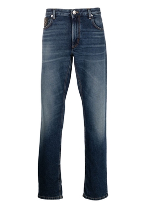 Roberto Cavalli faded-finish slim-cut jeans - Blue