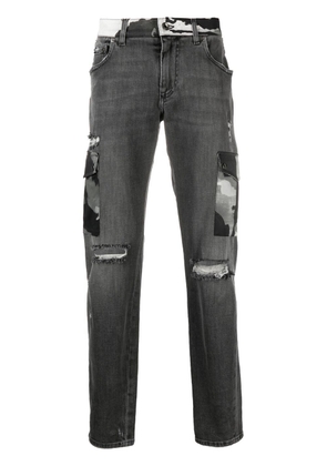 Dolce & Gabbana ripped camouflage-detail bootcut jeans - Black