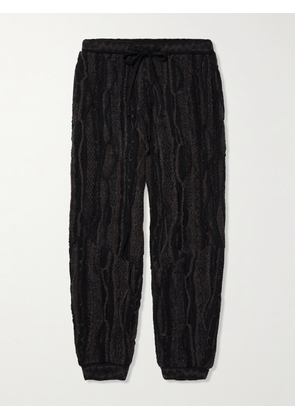 KAPITAL - Tapered Jacquard-Knit Cotton-Blend Drawstring Trousers - Men - Black - 1