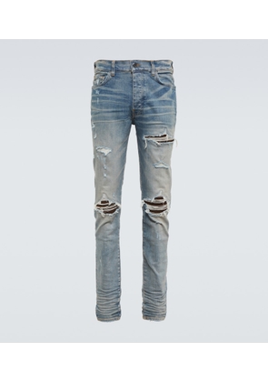 Amiri MX1 distressed skinny jeans