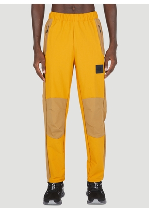 Yellow Denali fleece and shell track pants