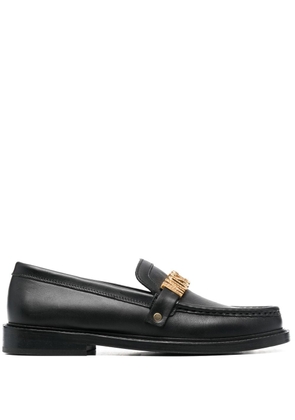 Moschino logo-lettered loafers - Black