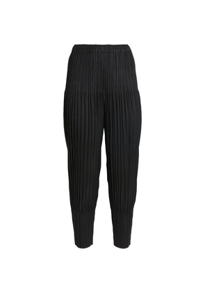Pleats Please Issey Miyake Pleated Tapered Trousers