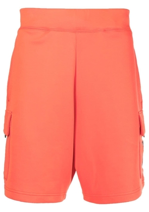 A BATHING APE® Ape Head cargo shorts - Orange