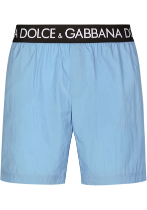 Dolce & Gabbana logo-waist swim shorts - Blue