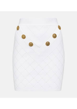Balmain Embellished ribbed-knit miniskirt