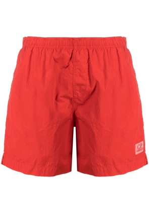 C.P. Company logo-patch swimming shorts - Red