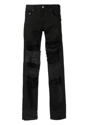 Undercover distressed-effect skinny-cut trousers - Black