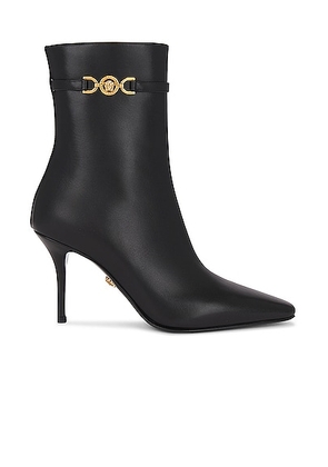 VERSACE Calf Leather Booties in Black - Black. Size 36 (also in 36.5, 37, 38.5, 39, 40).