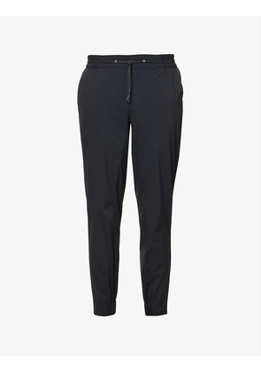 Urban Theran tapered-leg mid-rise woven trousers