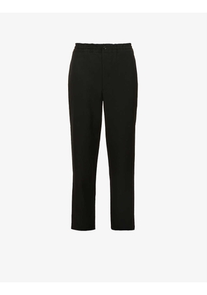 Drawstring-waist slip-pocket relaxed-fit tapered wool trousers