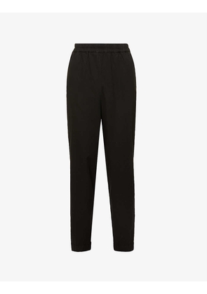 The Acrobat tapered mid-rise cotton trousers