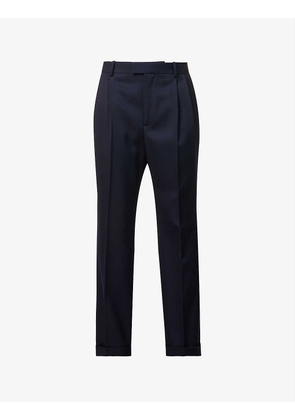 Pressed-crease folded-hem tapered mid-rise stretch-wool trousers