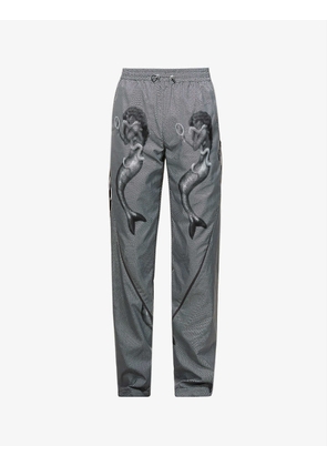 Mami Wata graphic-print relaxed-fit tapered-leg recycled-polyester trousers
