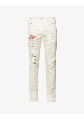 Destroyed slim-fit tapered-leg stretch-denim jeans