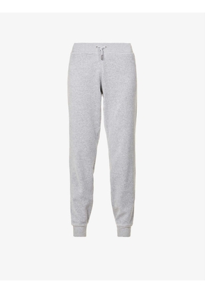 Logo-embroidered tapered mid-rise velour jogging bottoms