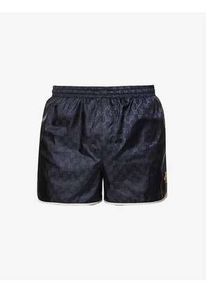 Monogram-pattern relaxed-fit swim shorts