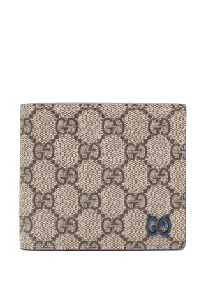 Gucci logo-plaque monogrammed wallet - Brown