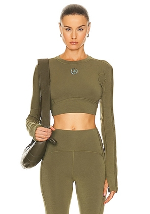adidas by Stella McCartney True Strength Yoga Crop Top in Focus Olive - Olive. Size XS (also in S).