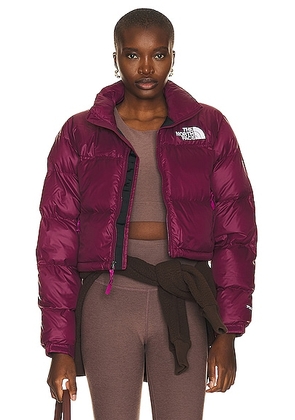The North Face Nupste Short Jacket in Boysenberry - Burgundy. Size XS (also in L, M, S, XL).