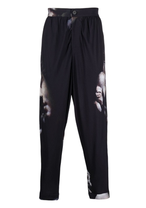 Atu Body Couture x Tessitura graphic-print tapered trousers - Black
