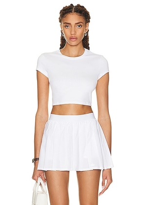 alo Soft Crop Finesse Short Sleeve Top in White - White. Size XS (also in L, S).