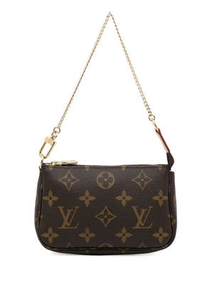 Louis Vuitton 2023 pre-owned mini Pochette Accessoires clutch bag - Brown