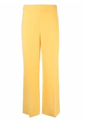Boutique Moschino tailored side-slit trousers - Yellow