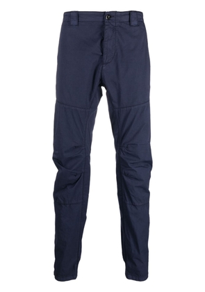C.P. Company logo-patch tapered trousers - Blue