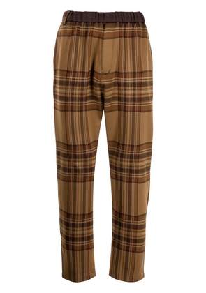 White Mountaineering check tapered trousers - Brown