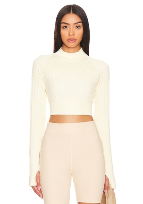 alo Seamless Cable Knit Top in Cream. Size L, M, XS.
