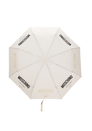 Moschino logo-print compact umbrella - Neutrals