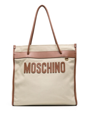 Moschino logo-patch canvas shoulder bag - Neutrals