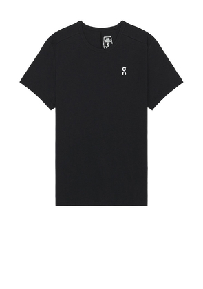 On Tee in Black. Size XL/1X.