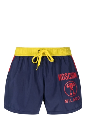 Moschino logo-print swim shorts - Blue