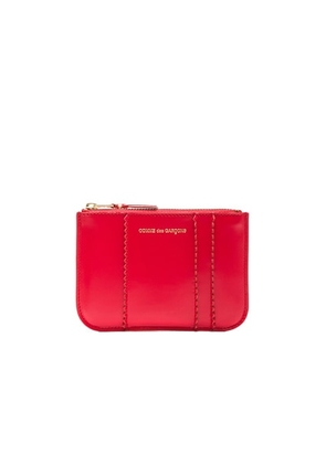 COMME des GARCONS Raised Spike Small Pouch in Red - Red. Size all.