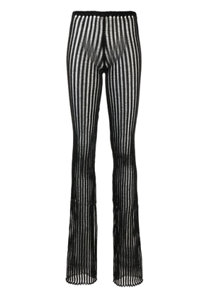 A. ROEGE HOVE Patricia striped sheer flared trousers - Black