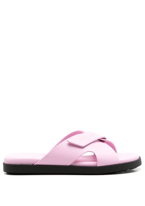 Ferragamo embossed-logo crossover-strap sandals - Pink